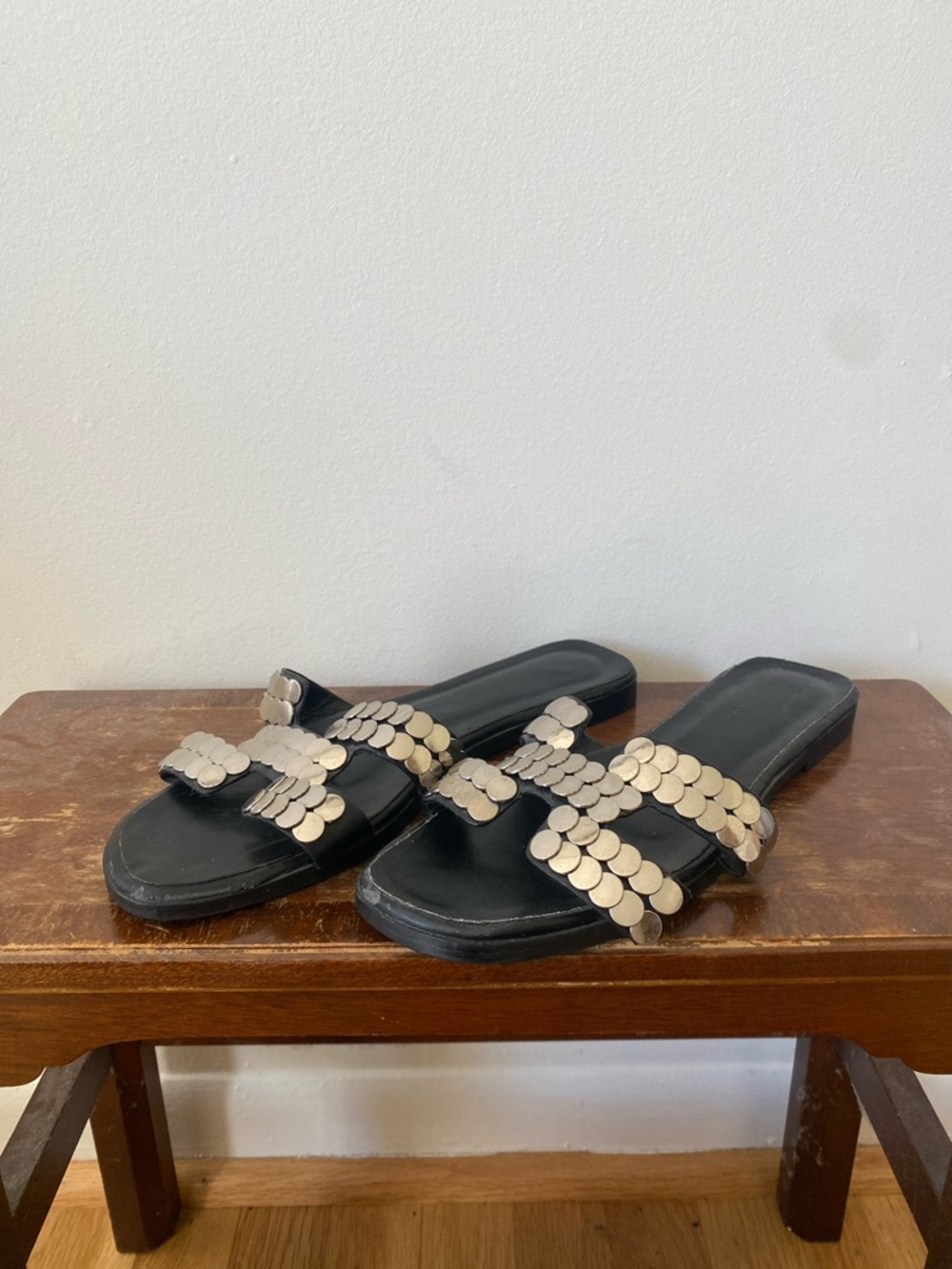 Black Oran Style Slide Sandals with Silver Disc Embellishments